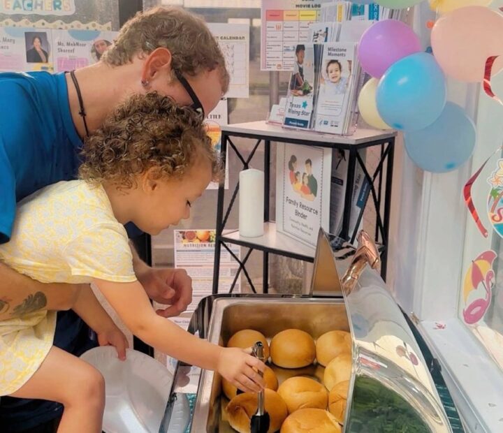 Child taking part in a supervised baking activity