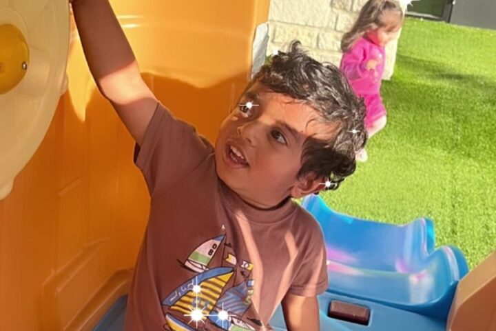 Child taking part in an age-appropriate outdoor movement activity