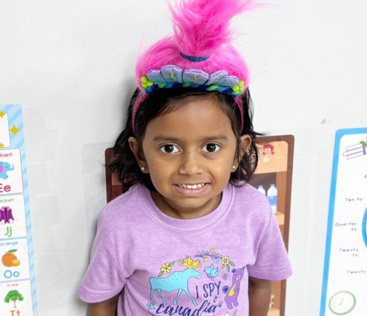 Child participating in a colorful special-day activity