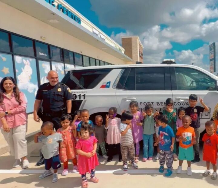 Children and staff during an outdoor community visitor activity